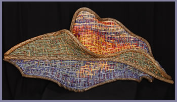 Bantam Lake, a mountainscape woven by master basket weaver Tina Puckett