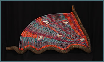 Sea Shell is a freestanding woven sculpture by master basket weaver Tina Puckett