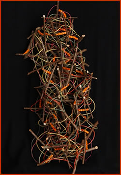 Snarl is a wallhanging woven sculpture by master basket weaver Tina Puckett of Winsted, CT