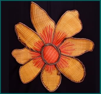 Sunshine, a woven sunflower by master weaver Tina Puckett
