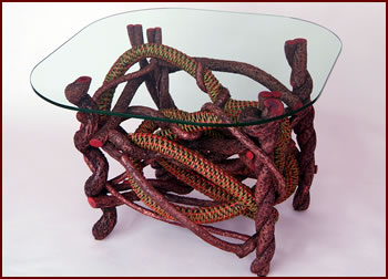 Curves and Curles, an end table built and custom woven by master weaver Tina Puckett of Winsted, CT